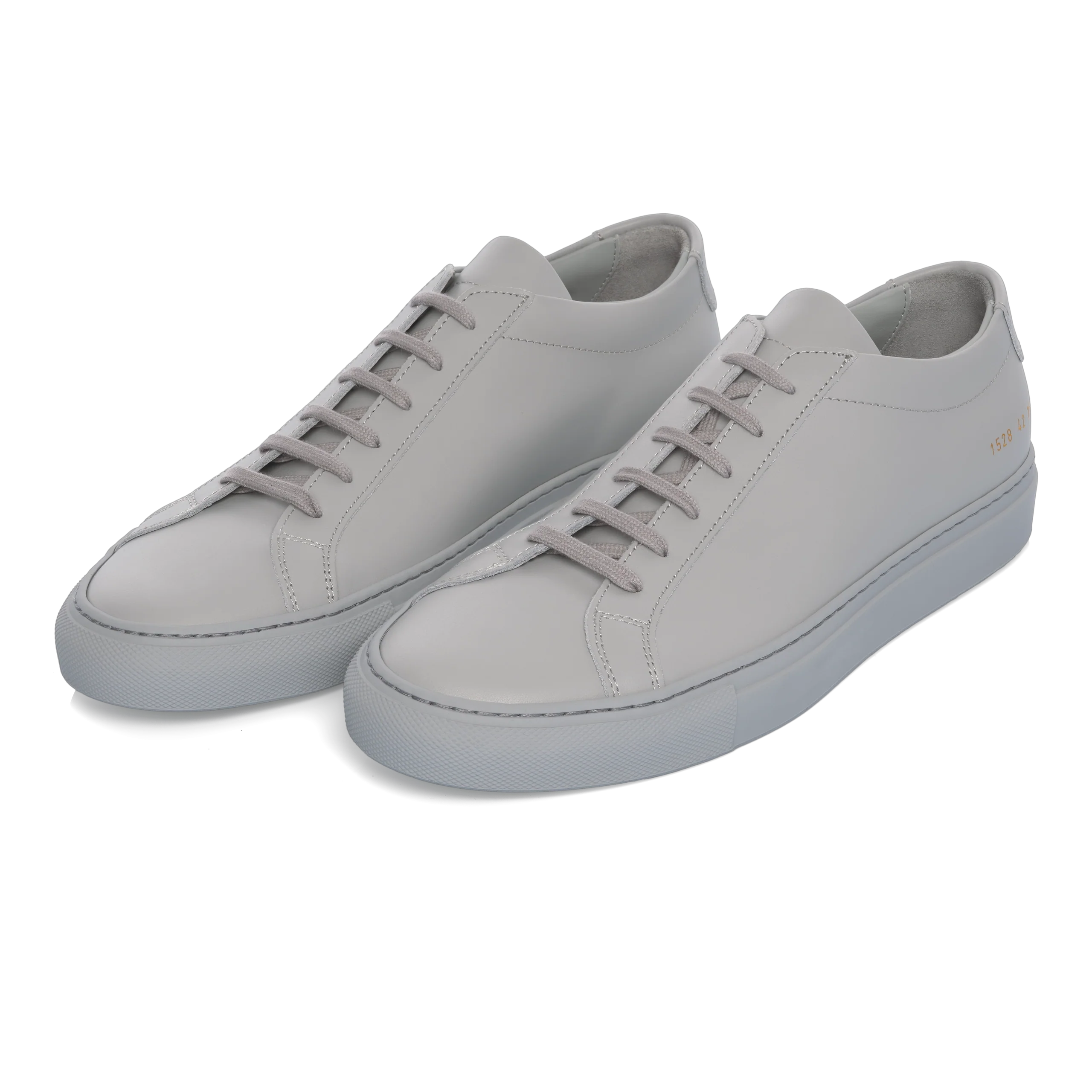 Common Projects Achilles Low collection in white, black, and suede