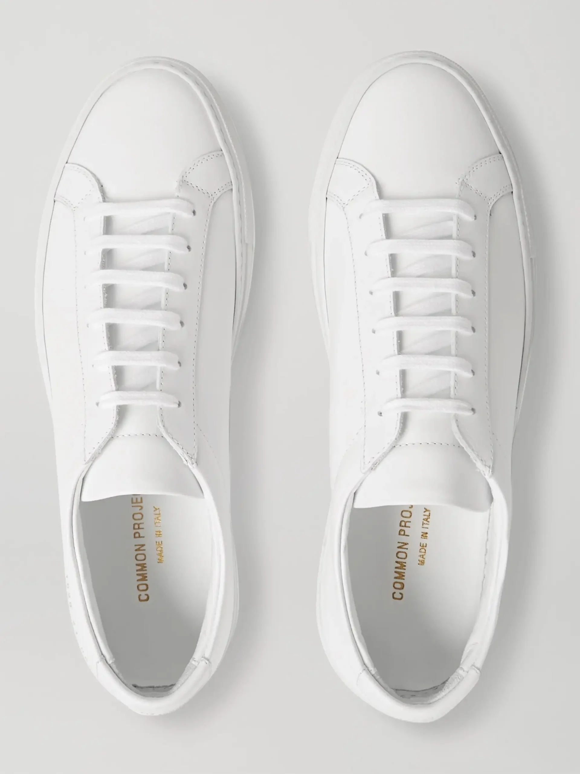 Common Projects Achilles Low collection in white, black, and suede